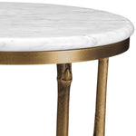 Eichholtz Side Table Pigna vintage brass finish Introducing the Pigna Side Table, an enchanting blend of nature and sophistication. A casted brass b