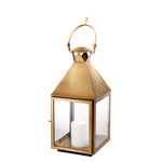 Eichholtz Hurricane Spur S antique brass finish Up the ambiance of your living space with the Spur S Hurricane. With a burning candle inside, this l