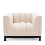 Eichholtz Chair Ditmar bouclé cream Resting upon a black finish base and upholstered in cream-coloured bouclé, Chair Ditmar will bring l