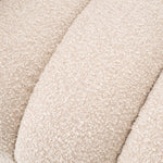 Eichholtz Chair Ditmar bouclé cream Resting upon a black finish base and upholstered in cream-coloured bouclé, Chair Ditmar will bring l