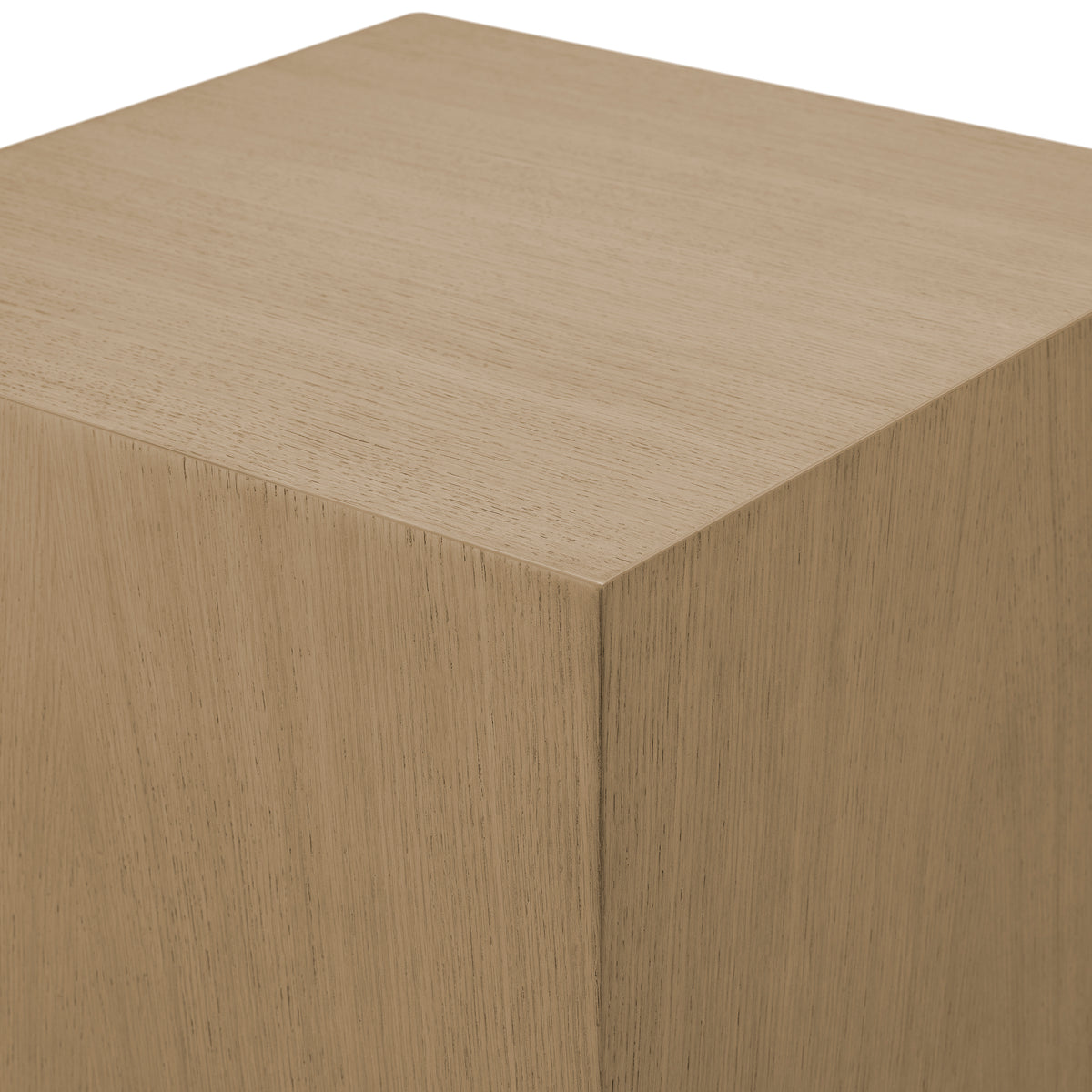 Beige cube with a textured surface on a white background