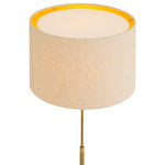 Lifestyle angle of Floor Lamp Rialta with refined Travertine Base, Vintage Brass tones (Image 8)