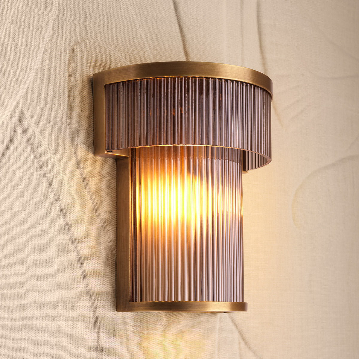 Close-up of Wall Lamp Andromeda highlighting Brass, Glass and Antique Brass, Smoke Glass (Image 10)
