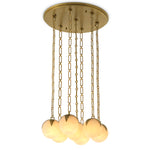 Chandelier Alesa L by Eichholtz in a styled setting — Antique Brass, Alabaster (Image 4)