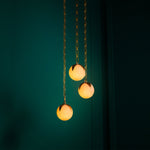 Close-up of Chandelier Alesa S highlighting Brass, Alabaster and Antique Brass, Alabaster (Image 10)