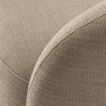 Lifestyle angle of Swivel Chair Brice with refined Avalon Sand, Brushed Brass Swivel Base tones (Image 8)