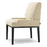 Dining Chair Bromley with arm by Eichholtz in a styled setting — Black, Arden Natural (Image 4)