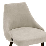 Eichholtz Bar Stool Cedro into your home with the Cedro Bar Stool. Featuring a clarck sand upholstered seat with