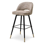 Eichholtz Bar Stool Cliff set. Featuring black tapered legs with gold caps and a Mademoiselle beige upholstery, each bar