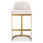 Eichholtz Bar Stool Condos bar stool is elevated with a brushed brass finish, adding a touch of sophistication to
