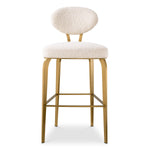 Eichholtz Bar Stool Dorrego its slim and elegant stainless-steel frame with a brushed brass finish adds a touch of