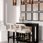 Eichholtz Bar Stool Roumier an 18th-century French armchair in The Met collection. Featuring Palmer beige upholstery and black legs