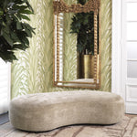 Eichholtz Bench BjÃ¶rn Lyssa Sand, its curved shape provides a unique and inviting seating experience. The black wooden