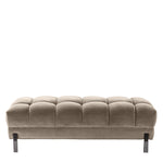 Eichholtz Bench Sienna a tufted upholstery in mellow Savona greige velvet. Black finished legs add extra glamour to