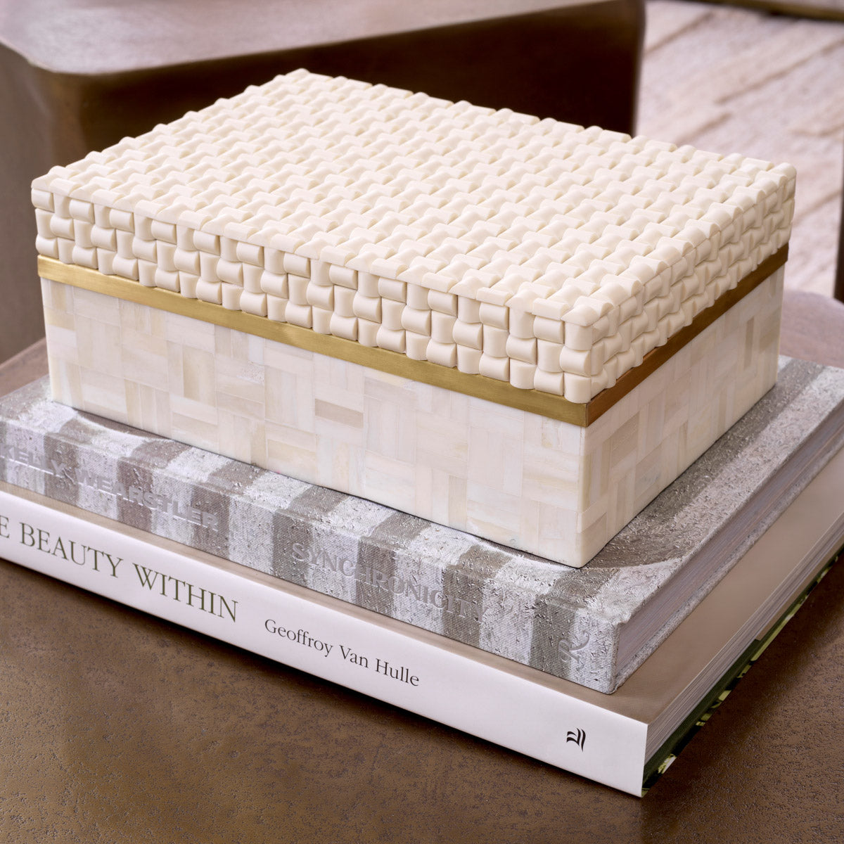 Eichholtz Box Seaside S in the mixed patterns handcrafted onto the cream colored resin. Discover a luxurious storage solution