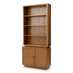 Eichholtz Cabinet Borchard Elevate your interiors with the Cabinet Borchard, where caramel oak veneer meets intricate rattan paneling.