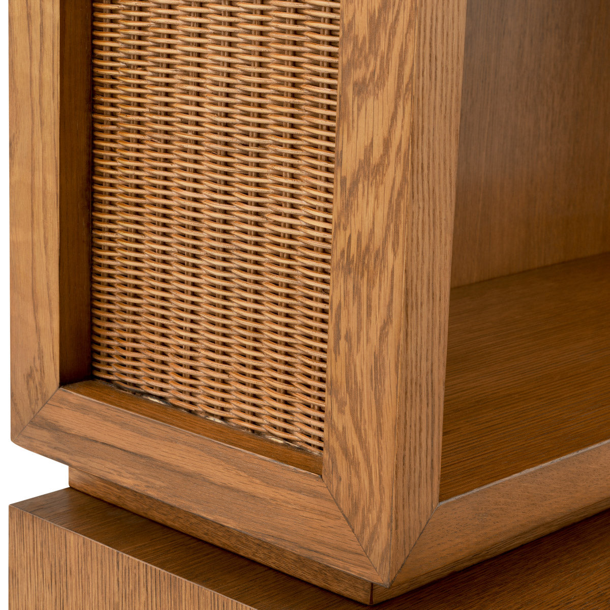Eichholtz Cabinet Borchard caramel oak veneer meets intricate rattan paneling. This luxurious piece, suffused with a warm golden