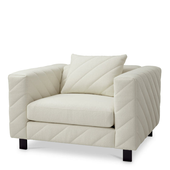 Eichholtz Chair Avellino Elevate your living space with the Eichholtz Avellino Armchair, upholstered in luxurious Rèªve cream fabric.