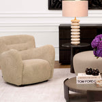 Eichholtz Chair Bixby a Canberra sand upholstery that adds warmth and texture to your interior, whilst the sturdy