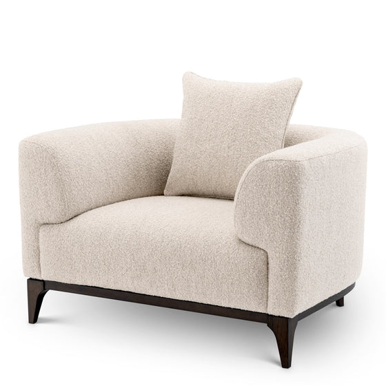 Eichholtz Chair Brannan Experience the understated elegance of the Eichholtz Chair Brannan Bouclé Chalk White. Upholstered in plush