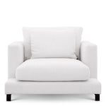Eichholtz Chair Burbury and softness that its feather cushions provide. Laze in the deep and comfy shape of