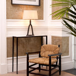 Eichholtz Chair Elliott its iconic design and meticulous details, the natural and intricately woven seagrass rush merge to