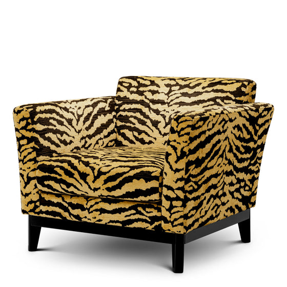 Eichholtz Chair Flux Unveil your space with the bold elegance of the Chair Flux in Tigris brown. This