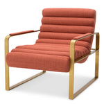 Eichholtz Chair Olsen Introduce the Scalea orange elegance of Eichholtz's Chair Olsen to your space. This luxurious armchair