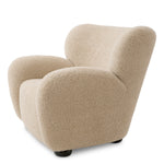 Eichholtz Chair Thames armchair pairs refined design with elevated materials for a statement in any luxury interior. Dimensions