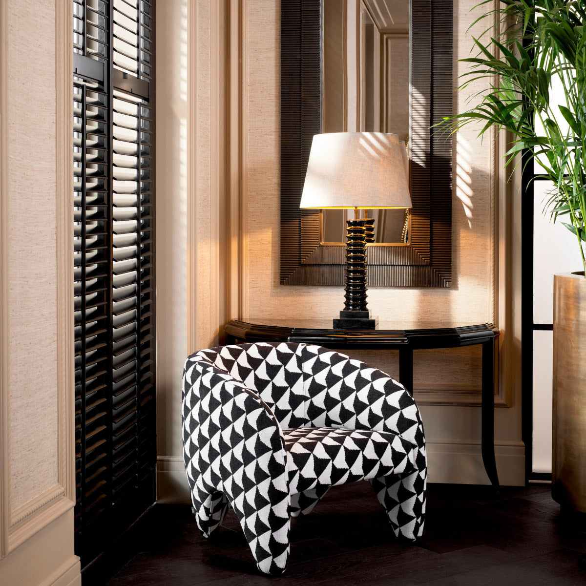 Eichholtz Chair Toledo defines any living space. This striking chair is upholstered in Zenith black and white fabric,