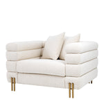 Eichholtz Chair York The fabulous bouclé cream York Chair with brushed brass legs oozes a touch of decadence.