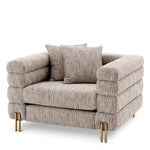 Eichholtz Chair York Featuring a Mademoiselle beige upholstery and brushed brass legs, the wonderful York Chair oozes a