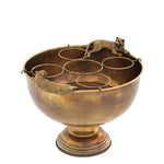 Eichholtz Champagne Cooler Jordan This eye-catching ice bowl comes in a vintage brass finish. It features two handles in