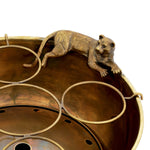 Eichholtz Champagne Cooler Jordan the shape of a puma and offers space to five bottles. Champagne Cooler Jordan Crafted