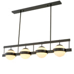 Eichholtz Chandelier Biba finish that holds 5 white glass globes. It works really well over a large dining