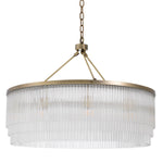 Eichholtz Chandelier Hector L design is embellished with tiers of clear glass rods. It gives a pleasing ambient light