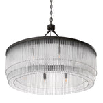 Eichholtz Chandelier Hector L design is embellished with tiers of clear glass rods. It gives a pleasing ambient light