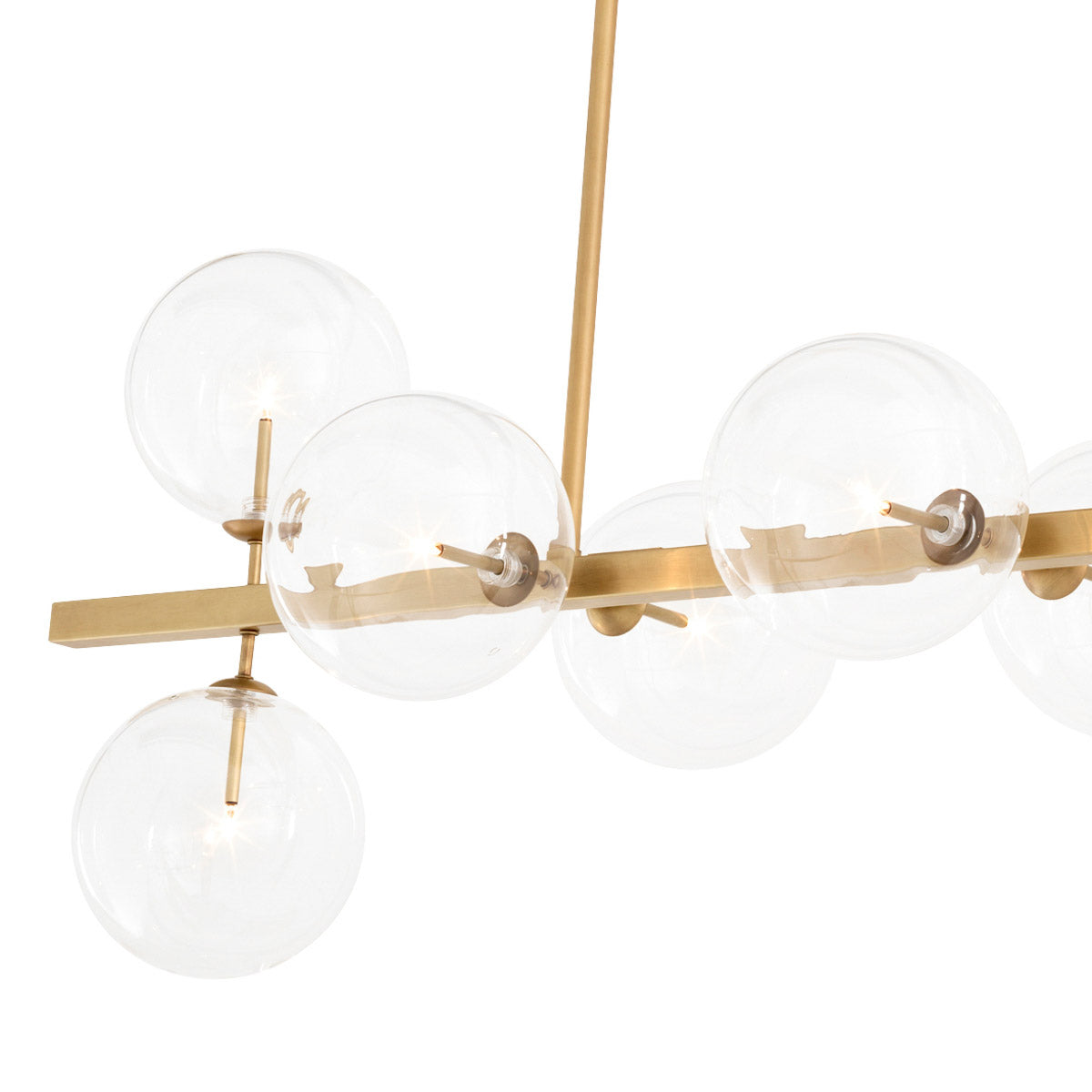 Eichholtz Chandelier Largo this luminaire reflects unfettered light off the antique brass finish, bringing a great atmosphere to