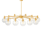 Eichholtz Chandelier Selva room. Its clean-line base with gold finish gives this lustrous crown a modern look, providing