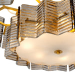 Eichholtz Chandelier Silvano the Chandelier Silvano, where smoke glass meets an antique brass finish, crafting a stunning focal