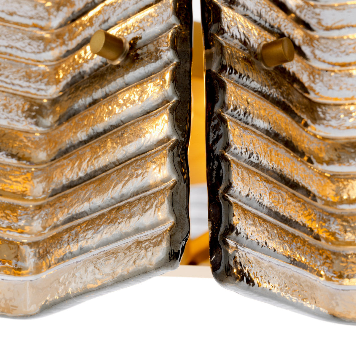 Eichholtz Chandelier Silvano point. Its sophisticated design complements high-end interiors, offering a graceful blend of modern elegance...