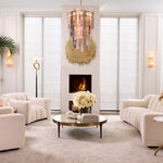 Eichholtz Coffee Table Artemisa L statement with an elegant metal frame in a brushed brass finish. The interior curves of