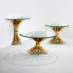 Eichholtz Coffee Table Bonheur sheaf-shaped base and a bevelled clear glass tabletop. Originally a symbol of prosperity and hospitality,