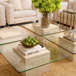 Eichholtz Coffee Table Brindisi beauty of travertine, with its subtle hues, is ingeniously paired with a clear glass top,