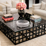 Eichholtz Coffee Table Cubico that exudes sophistication, this piece will seamlessly integrate into any interior design. The clear glass