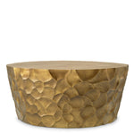 Eichholtz Coffee Table Fiorentino finish, providing a sense of everlasting ornateness. The surface of the circular top features a