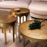 Eichholtz Coffee Table Gardini vintage brass finish adds a touch of warmth and character, while the rough texture gives