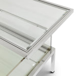 Eichholtz Coffee Table Harvey rectangular showcase decorative items. Comprising a polished stainless steel frame, it features a sliding d...