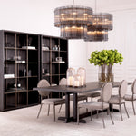 Eichholtz Column Aveiro of a black marble column on a grey marble plinth base, this decorative object is