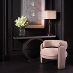 Eichholtz Console Table Odis a dark bronze finish. Its unique design emphasizes balance and sophistication, making it a perfect